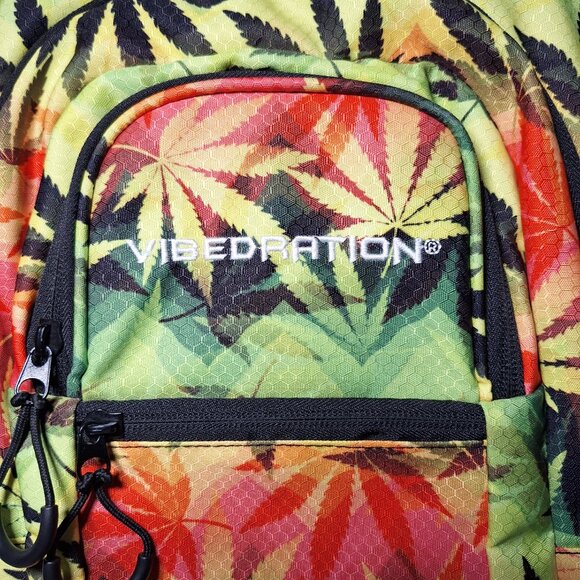 Vibedration Hydration Backpack w/o bladder - green, orange, black leaves… - Picture 5 of 16